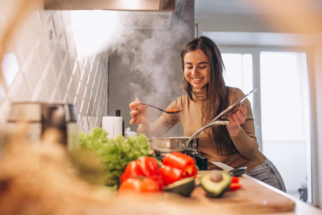 Cook your own meals at home - this will help you afford to live alone. 