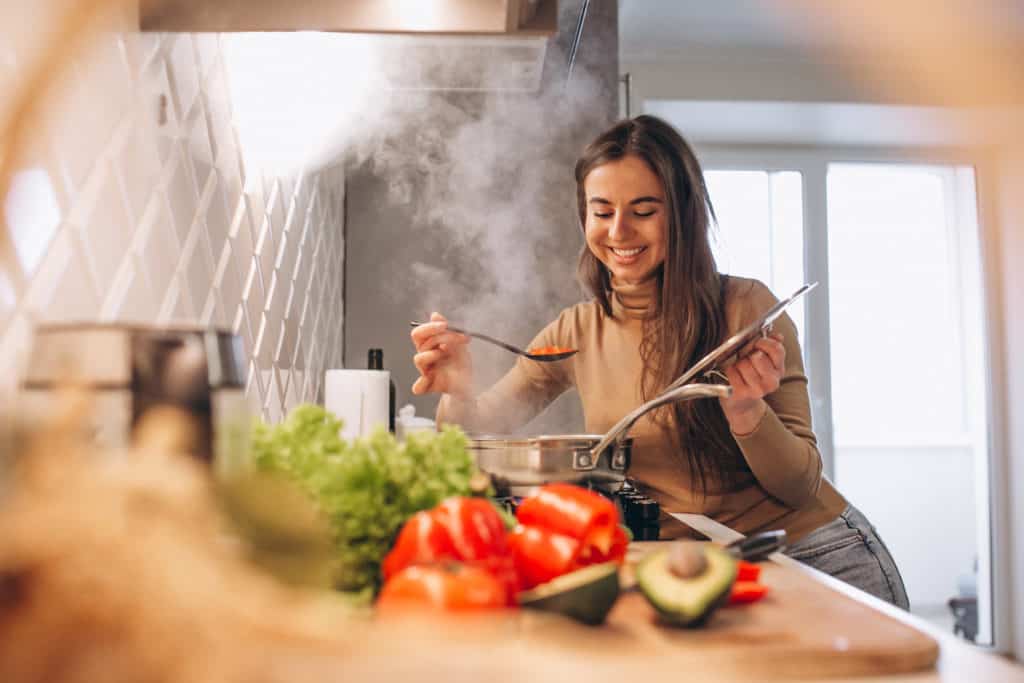 Cook your own meals at home - this will help you afford to live alone.